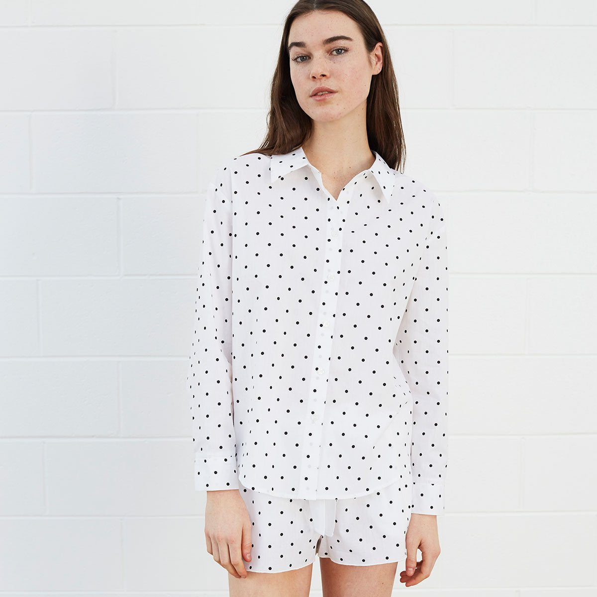 Woman wearing polka dot shirt